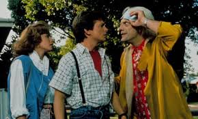 Doc Brown witrh Marty and his girlfriend.